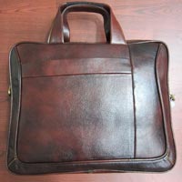 Leather Laptop Bag, Feature : Attractive Designs, Good Quality, High Grip, Water Proof, Pattern : Plain